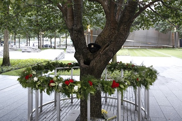 9/11 Tree surrounded by flower garland