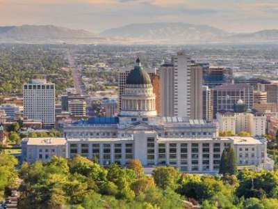 The Salt Lake City skyline on a Summer day with trees in the foreground